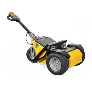 Alitrak TT-Plus Electric Tug moving heavy trailers safely in a warehouse