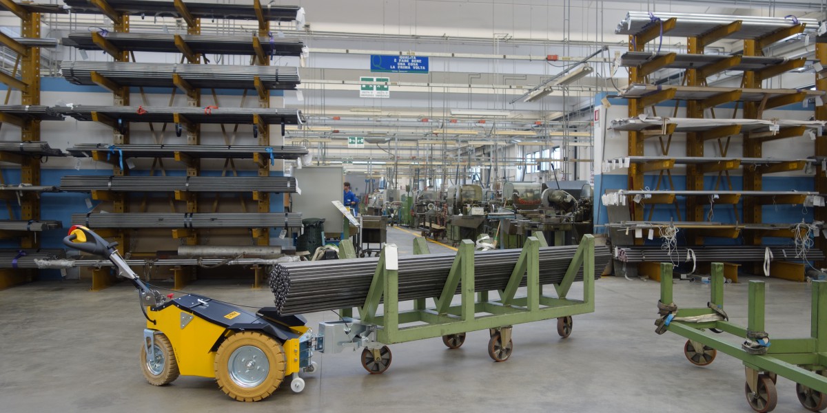 OT-1200 Outdoor Tug moving commercial waste containers