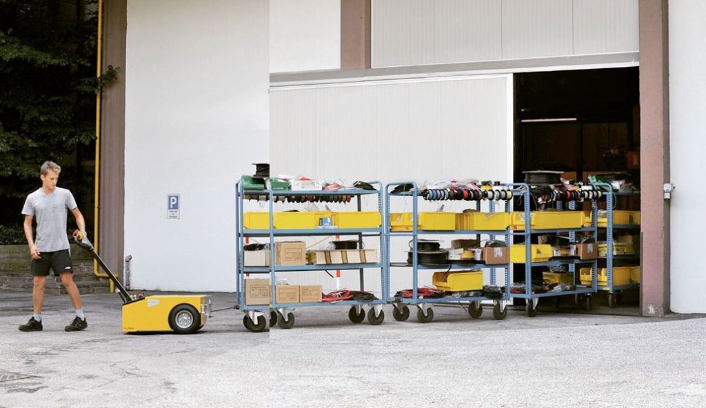Indoor Tug 1200 electric tug moving heavy industrial trolley