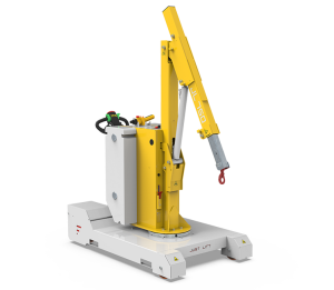 JL 750 folding crane lifting heavy equipment in a tight warehouse workspace