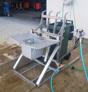 Mobile Wheelie Bin Washer tipping an 1100L bin for industrial waste cleaning