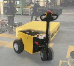 Alitrak electric tug used to reduce manual handling effort when moving heavy loads